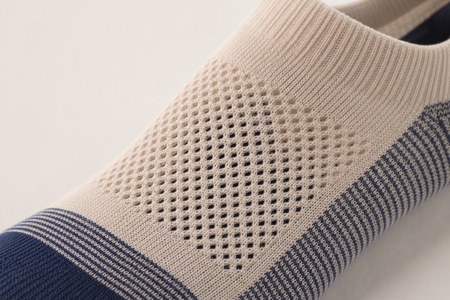 Breathable instep knit on a no-show sock