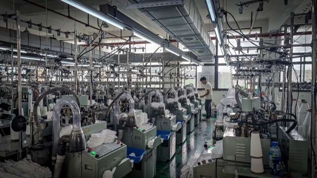 Running sock knitting production in the factory