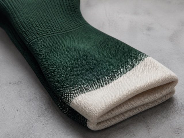 Moisture wicking cycling sock yarn and knit detail