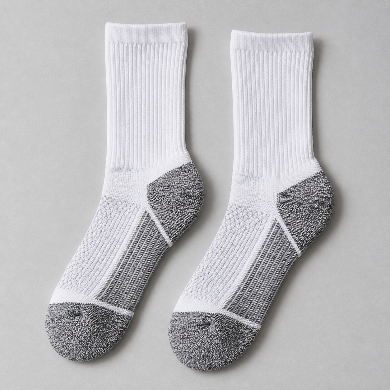 Golf sock reinforced heel and toe construction