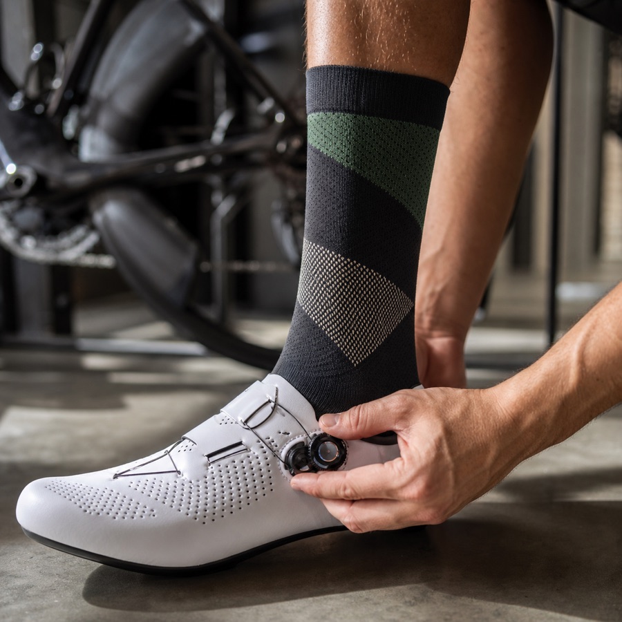 Cycling socks fitted inside cycling shoes