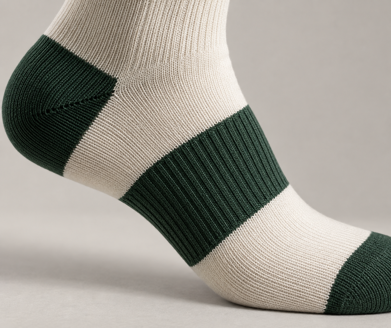 Illustrative arch-band knit direction on a bowling sock
