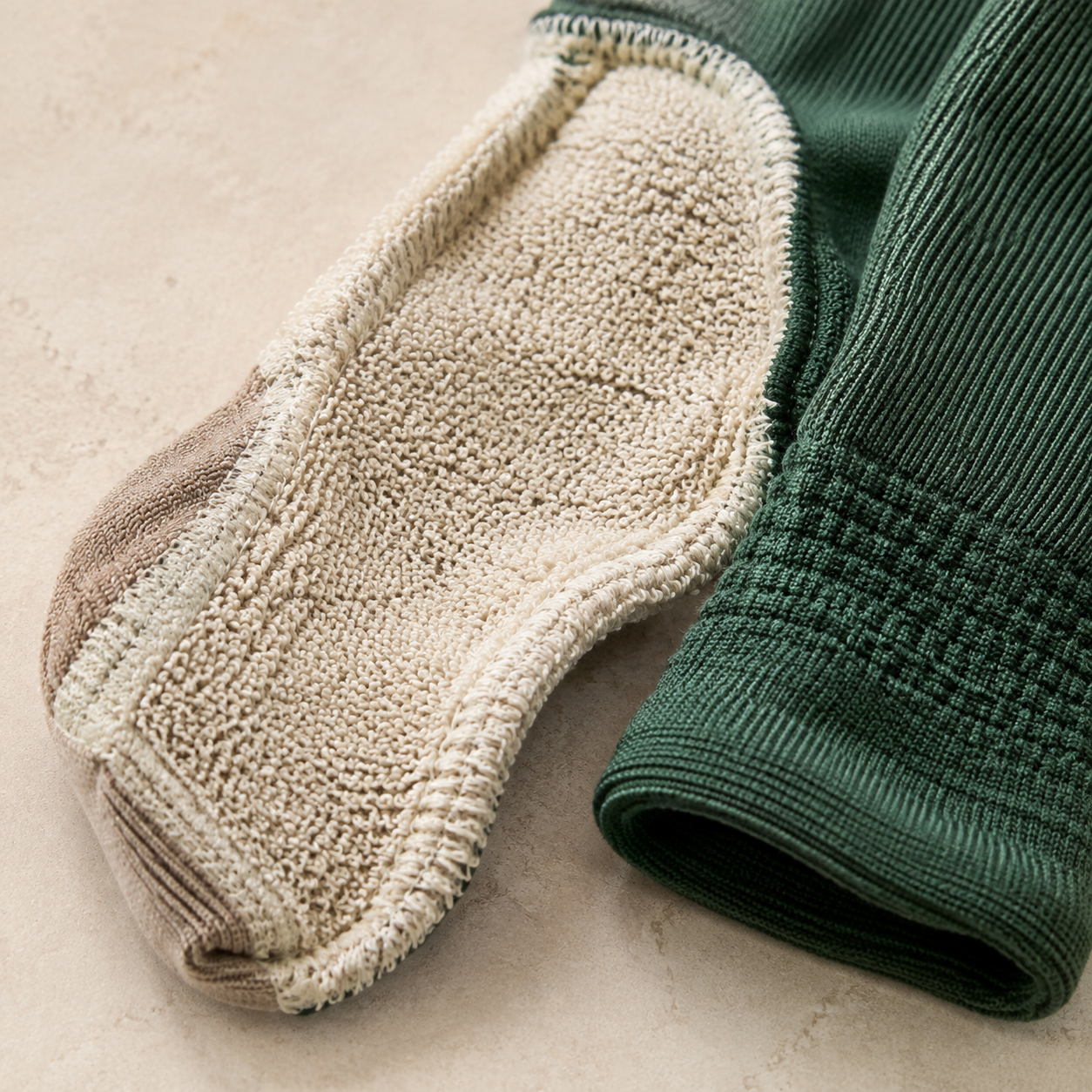 Illustrative terry-loop footbed direction for a riding sock