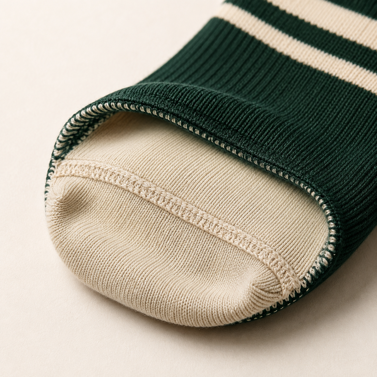 Close-up inside view of a flat smooth toe seam on a softball sock