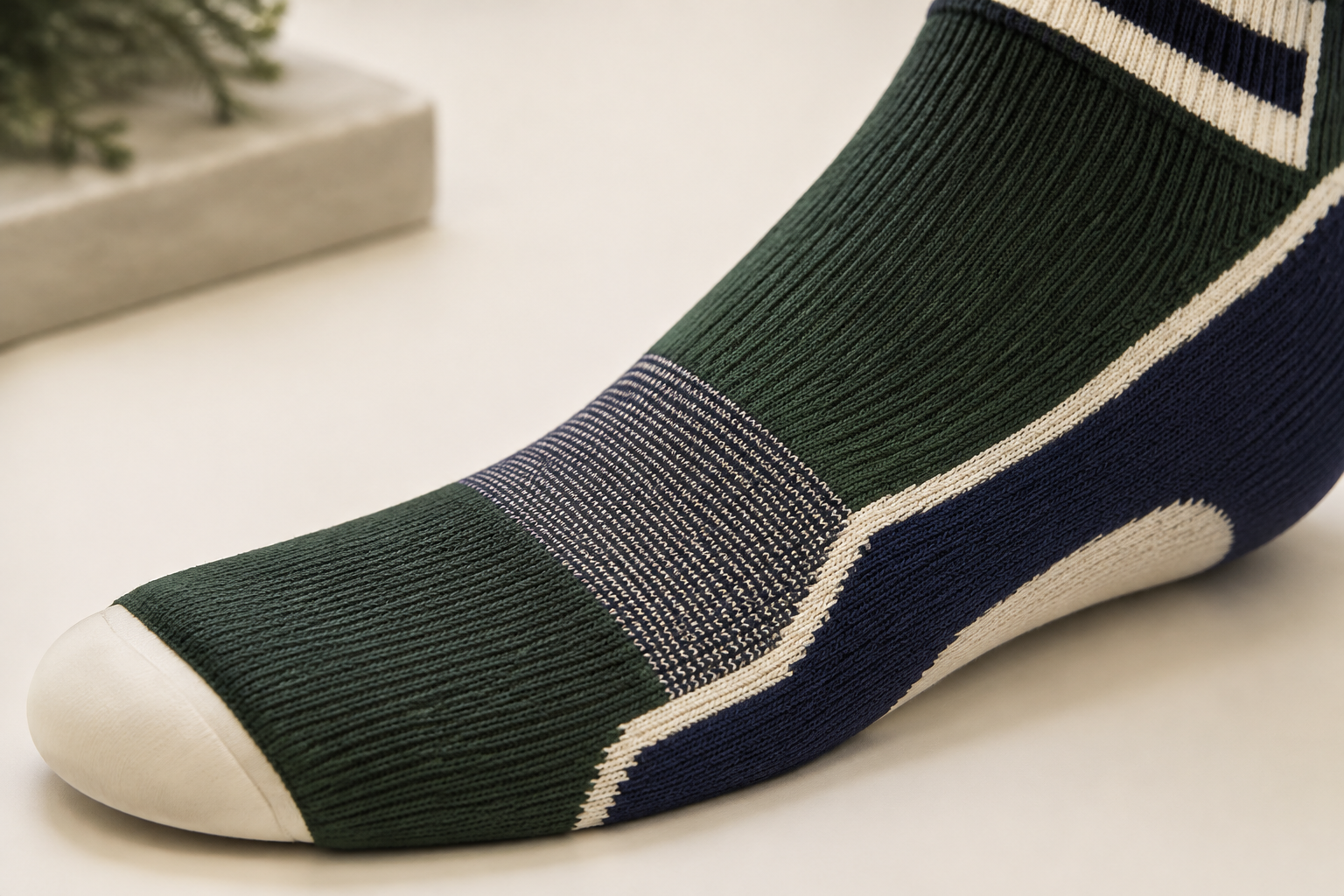 Illustrative low-bulk instep knit zone