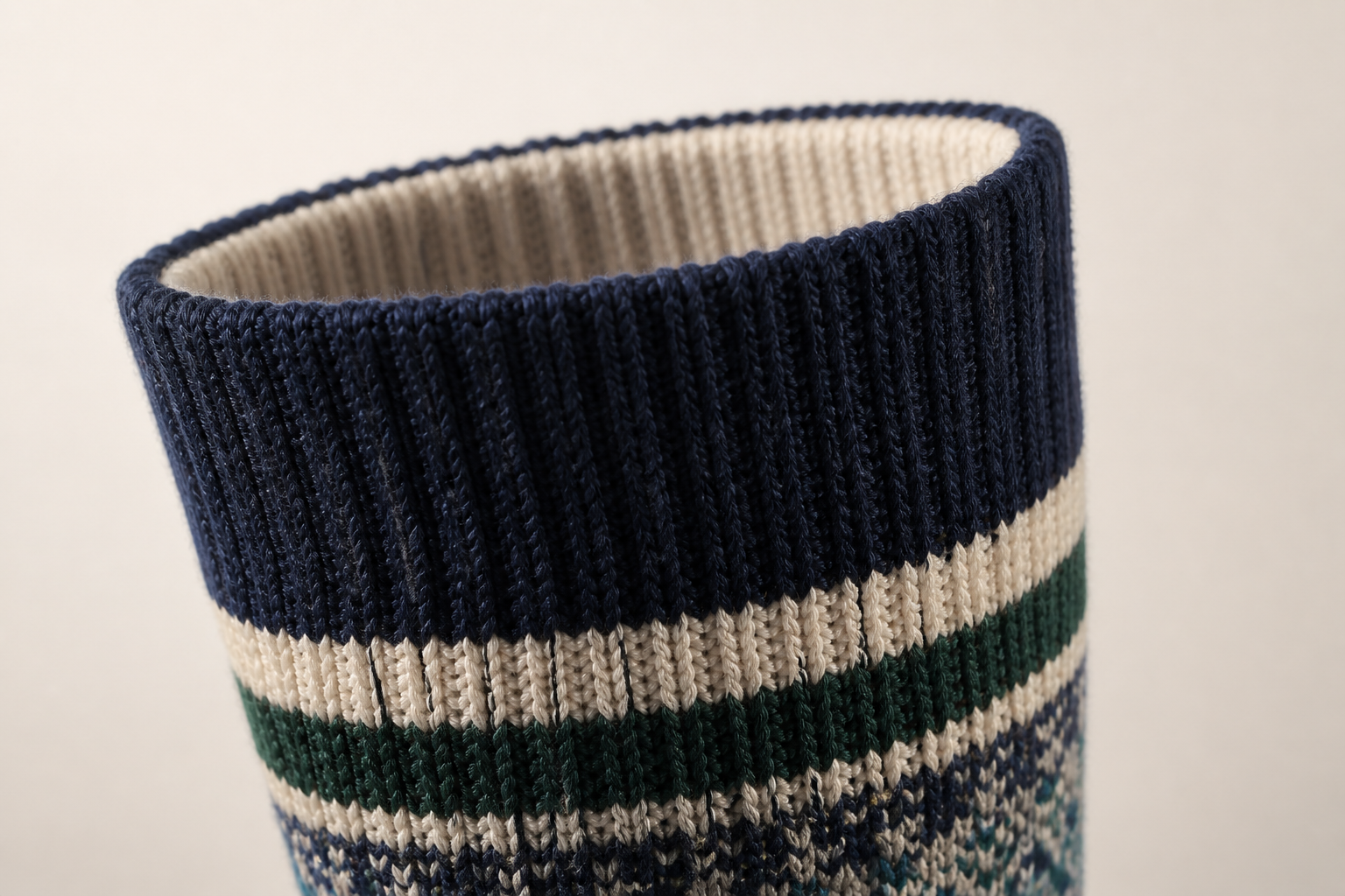 Illustrative ribbed stay-up cuff detail